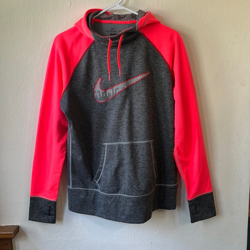 Women’s Nike Therma-Fit sweatshirt.